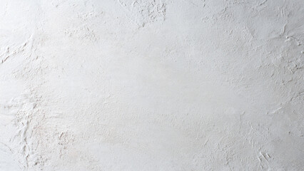 Fototapeta premium Bright white rough textured surface with subtle shadows and an abstract, uneven finish. Perfect for backgrounds and artistic overlays.