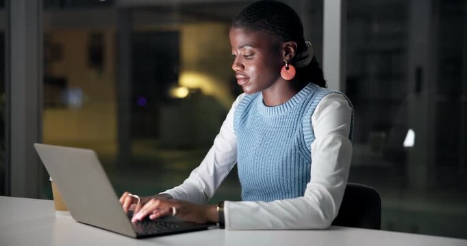Creative, black woman and laptop in office at night for research, editing article and draft update. Journalist, typing and pc to email editor, proofreading and submission for publication deadline