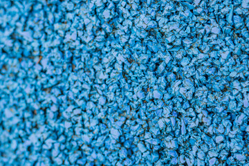 Texture of rubber flooring on a playground in close-up