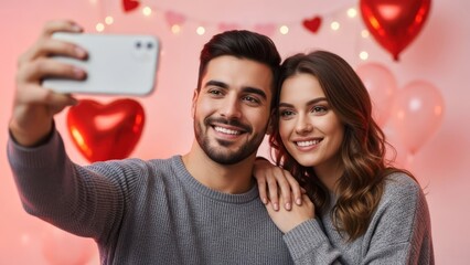 Happy young couple taking a selfie with a smartphone during a Valentine's Day party.