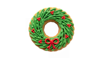Festive christmas wreath cookie with green frosting and red decorations on black on transparent background