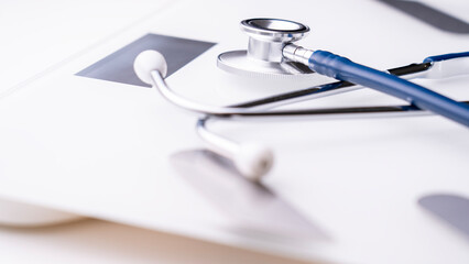 Contemporary digital scales with a stethoscope, measuring the proportion of body weight that is...