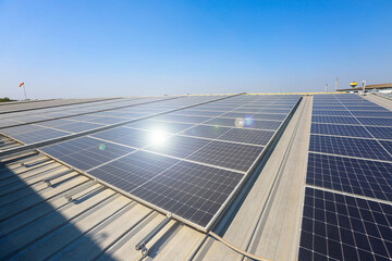 Photovoltaic solar power panel on blue sky ,green clean alternative energy. environmentally friendly. Clean energy and environment. 