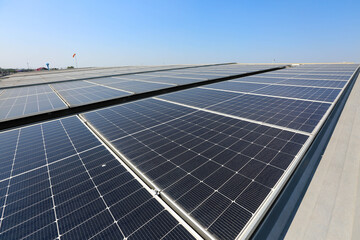 Photovoltaic solar power panel on blue sky ,green clean alternative energy. environmentally friendly. Clean energy and environment. 