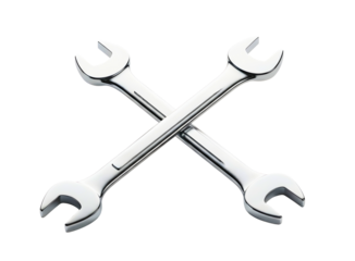 A striking studio shot of two chrome metal open-ended wrenches crossed on a black background isolated on transparent background