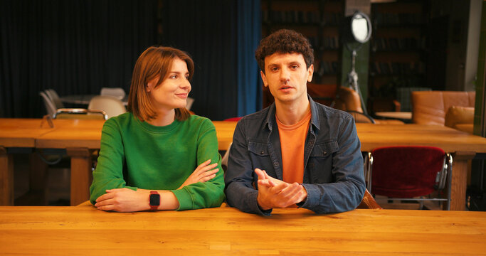 Young couple filming blog or video call looking at camera - Powered by Adobe