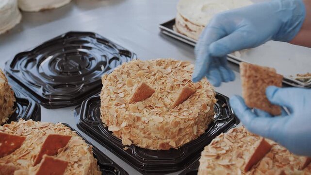 The final stage of making a cake in an industrial confectionery bakery