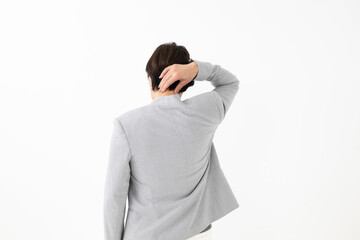 首、肩凝りに悩む女性