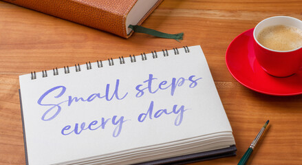  Notepad on a desk - Small steps every day