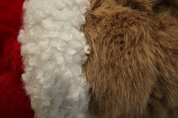 Close-up of fluffy textures in red, white, and brown, perfect for backgrounds