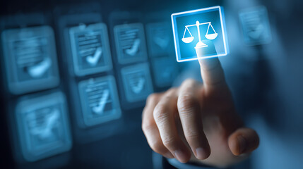 Human finger touching glowing scales of justice icon on digital interface legal balance