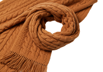 a luxurious, thick, burnt orange cable-knit wool and cashmere scarf tied in a voluminous parisian knot, detailed fringe, isolated on a transparent background, concept of luxury winter fashion