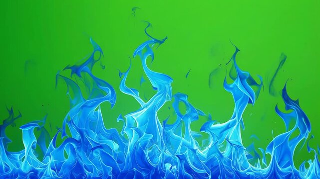 青い炎が広がるグリーンバックの幻想的な火の背景素材