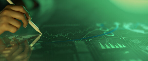 Interactive Global Financial Data Analysis Interface with Graph Trends on Touchscreen.