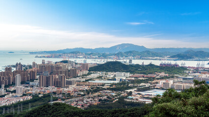 Fototapeta premium Panoramic view of urban area with sea and mountains in the background