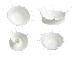 Four white liquid splashes, crown-like, dynamically frozen on black