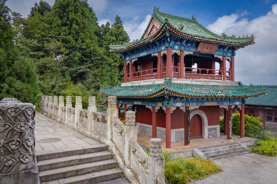 Traditional Chinese style wooden temple pagoda building at the Tianmenshan Temple located at the top of Tianmen Mountain in Zhangjiajie, Hunan, China