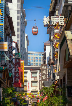 Cable car gondola surrounded by traditional Chinese buildings in Zhangjiajie China
