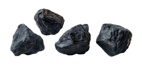 Obraz premium Four irregularly shaped dark grey rocks appear against a black background. Detailed, textured, close-up view