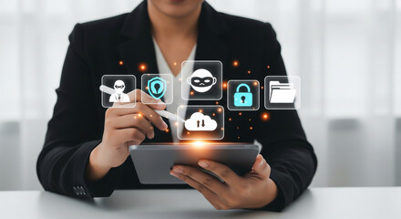 Business professional interacting with cybersecurity icons on a tablet, illustrating data protection, digital threat management, and secure cloud computing solutions.