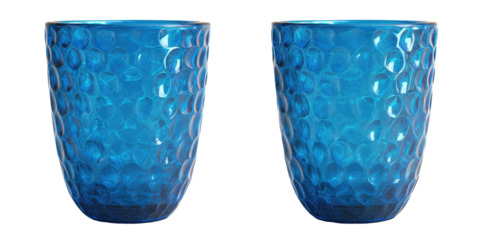 Two identical blue glasses, with textured surface against a stark black background