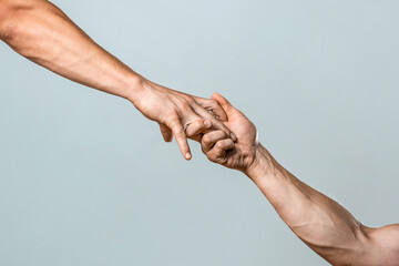 Closeup help hand. Closeup hand stretch. Helping hand outstretched, isolated arm, salvation