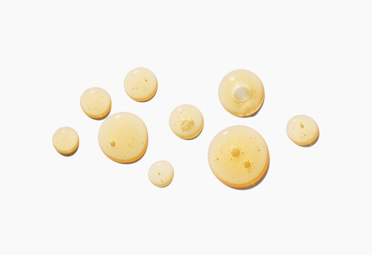 Cosmetic cleansing oil or serum emulsion or cleansing gel on isolated white background. Beauty product sample swatch