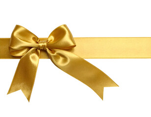 Fototapeta premium Shining golden satin bow and ribbon set against a black background