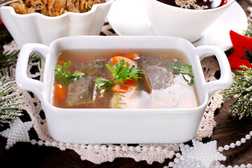  Traditional Christmas Eve carp in jelly, red borscht and sauerkraut with mushrooms
