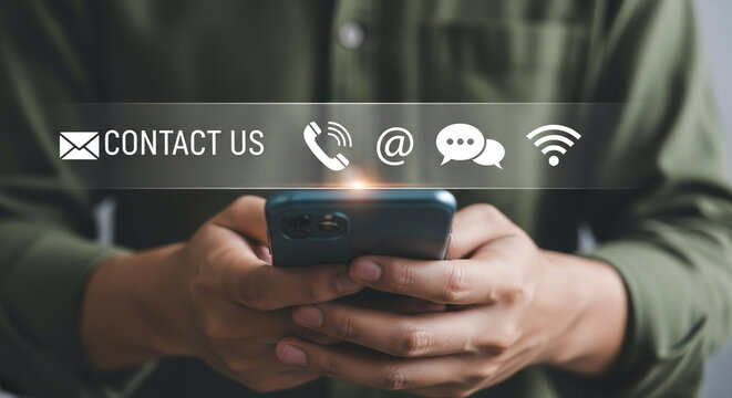 Man uses smartphone with contact us icons for communication and support showcasing email phone address chat and wifi connectivity for customer service and assistance - Powered by Adobe