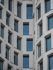 Modern building facade with geometric blue windows