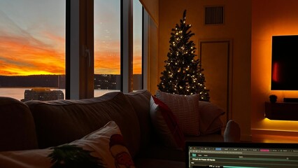Christmas tree cozy living room while sunset