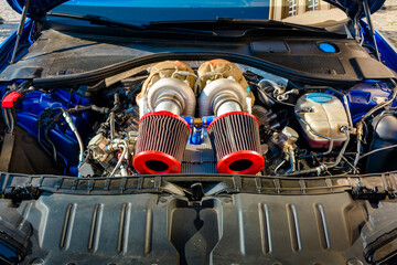 uzhhorod, ukraine - 31 nov 2021: audi gasoline car engine bay close up. perfect automotive air intake. powerful and high performance concept. background for maintenance and modification