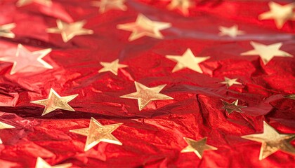 Golden Stars Scattered on Crinkled Red Foil Festive Background.