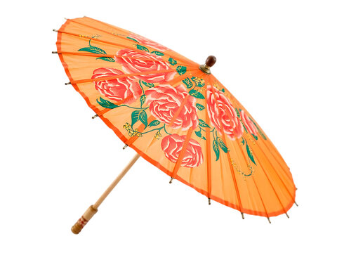 Decorative orange parasol with floral pattern isolated on white background