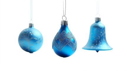Three vintage blue glass christmas ornaments hanging on strings isolated on transparent background