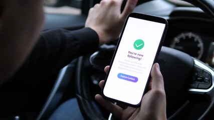 Hands of a user viewing a clear success message after subscribing to a blog via his mobile device. This video effectively demonstrates a positive user experience and the instant gratification of - Powered by Adobe