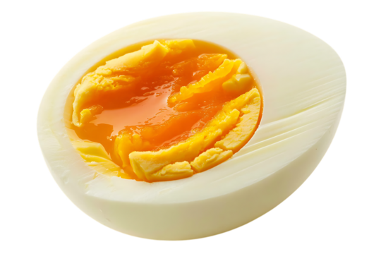 Half of a hard boiled egg with bright orange yolk isolated on white background
