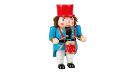 Isolated Toy Drummer Nutcracker Figure with a Red Hat and Blue Jacket is Playing the Drum