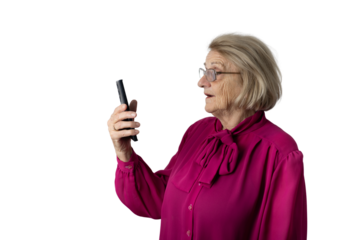Senior woman reacting to mobile phone video call