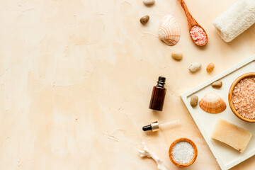 Obraz na płótnie Canvas Set of body care cosmetics products with essential oil scrubs and sea salt, top view. Aromatherapy spa products
