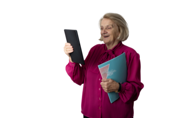 Senior woman laughing during video call with digital tablet