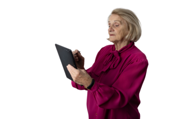 Senior woman learning using tablet and stylus