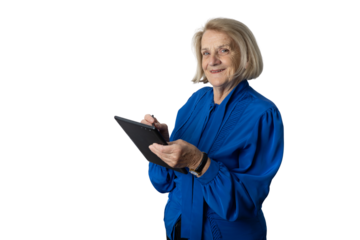 Senior woman using digital tablet smiling