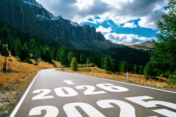 2026 New Year road trip travel and future vision concept . Nature landscape with highway road leading forward to happy new year celebration in the beginning of 2026 for glee and successful start .