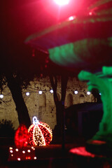 Colorful Christmas lights and decorations in park Dardin in Split, Croatia. December night in the park.