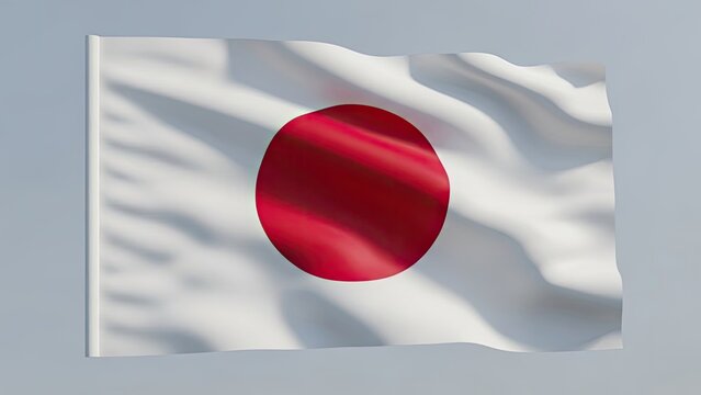 Close-up of the waving national flag of Japan, the Nisshoki, against a plain background