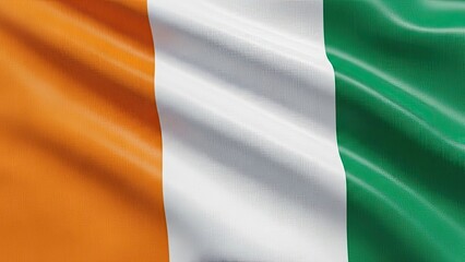 Obraz premium Ivory Coast National Flag Orange, White, and Green Waving in the Breeze