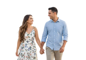 Couple holding hands and smiling at each other