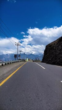 Passing the Iconic 'I Love Skardu' Welcome Sign on a Mountain Highway Drive - Vertical Travel.